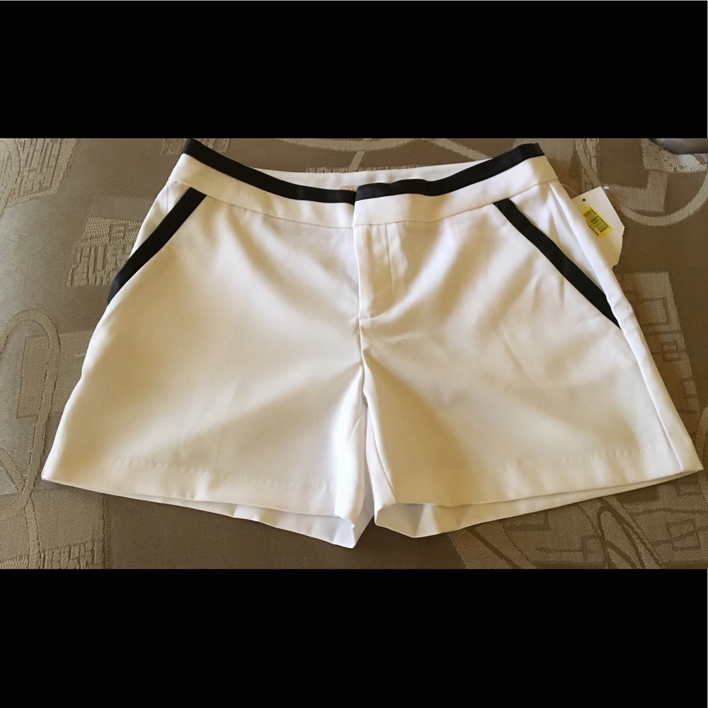 Wht shorts trimmed in faux leather.