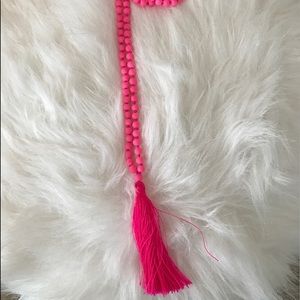 hot pink beaded necklace with tassel