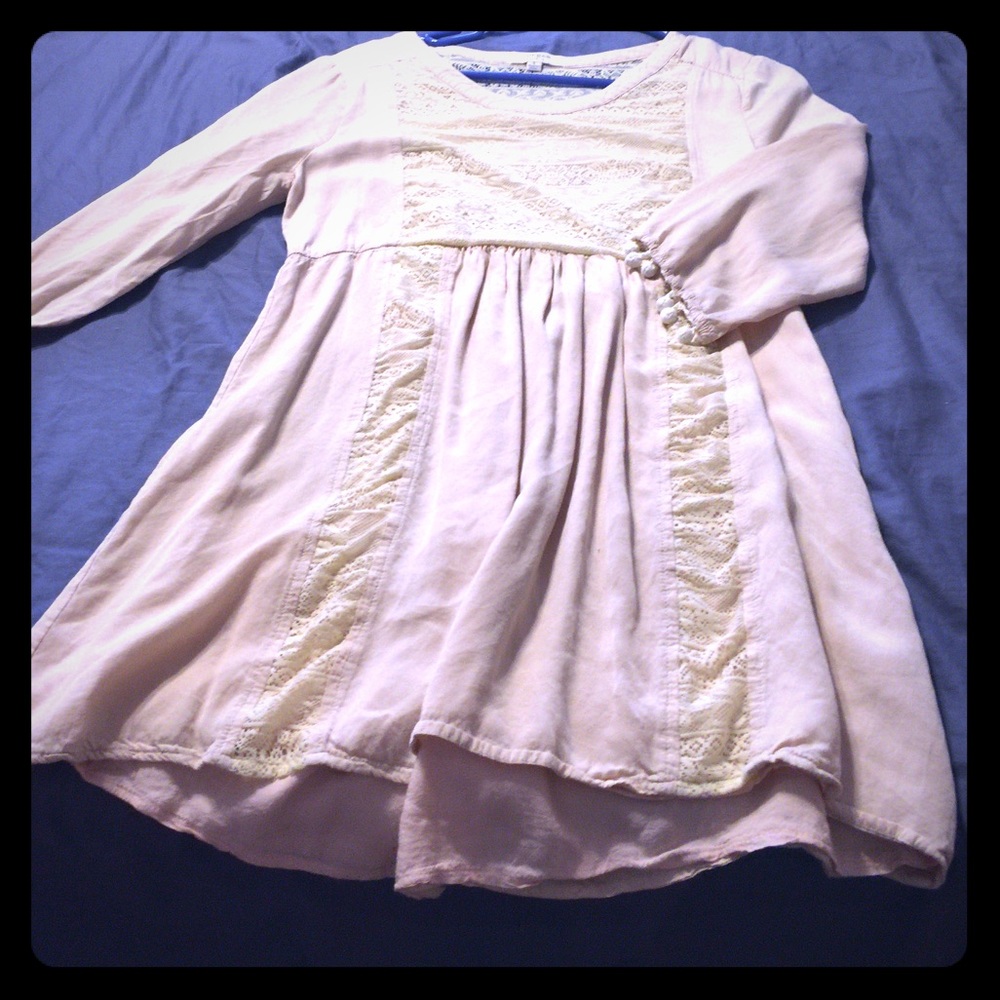 Off-white lace dress.