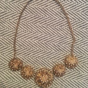 Gold and pearl statement necklace.