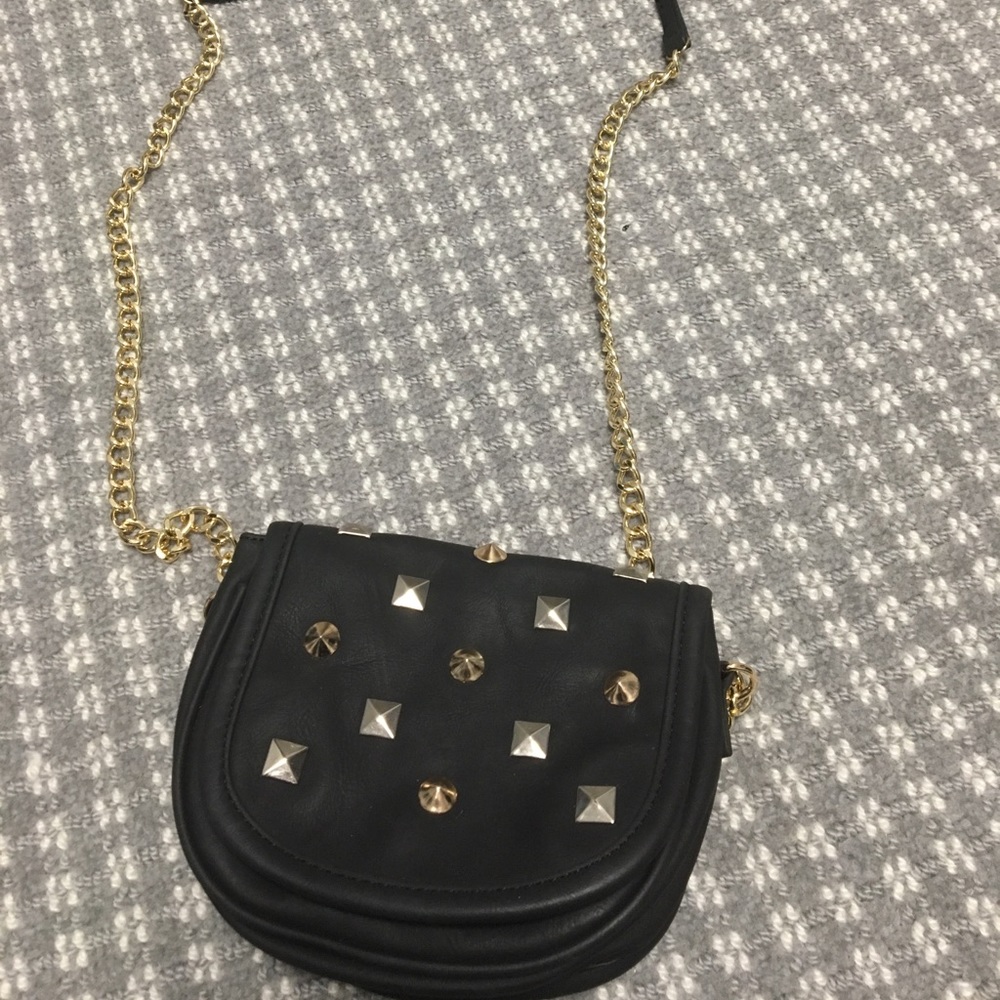Black and gold studded purse