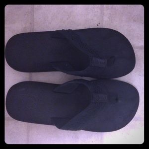 Black reef flip flops