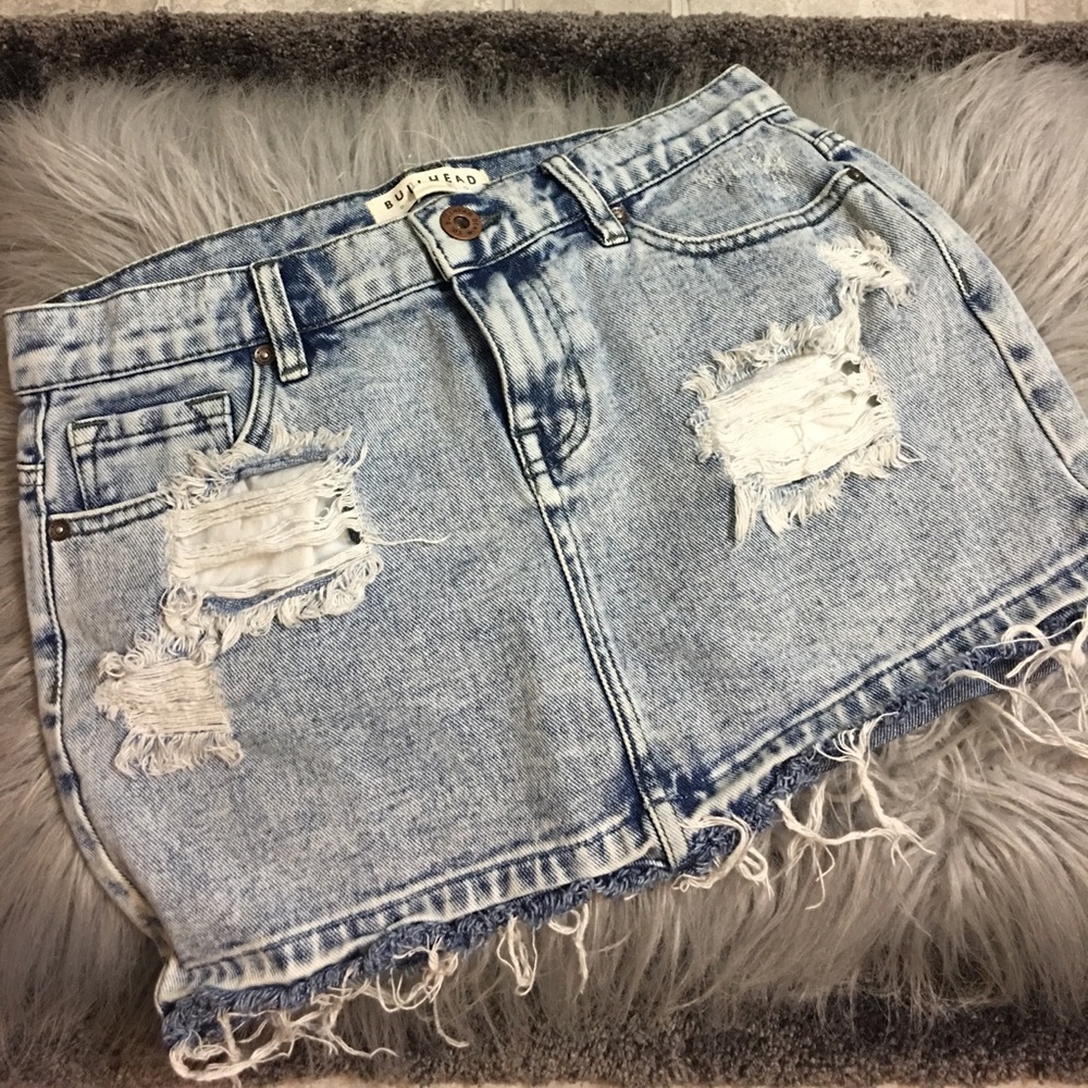 Distressed denim mini skirt
