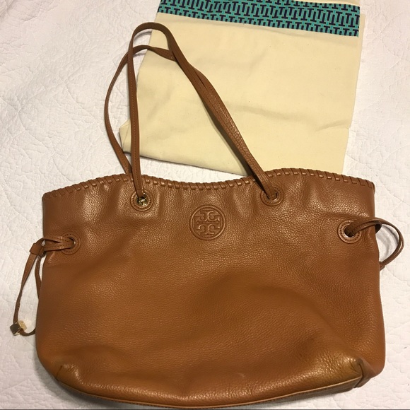 Tory Burch Handbags - Pre-loved Tory Burch Slouchy Marion Tote Tan
