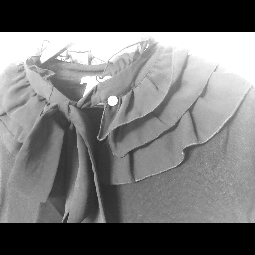 Black ruffle shirt