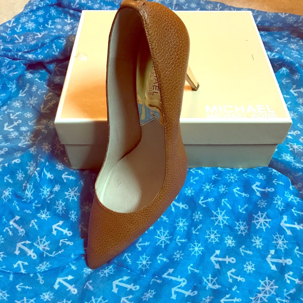 Brown Michael Kors heels with a gold accents