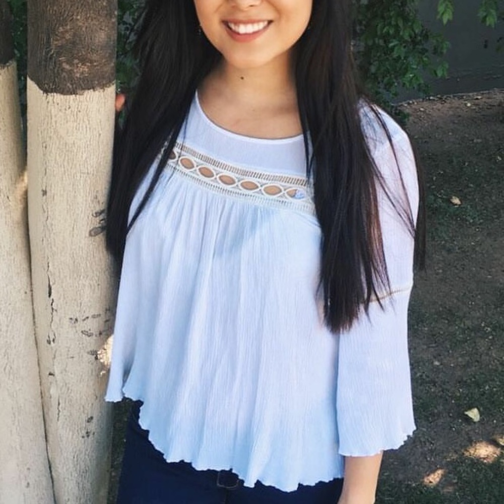 Delicate white long sleeve top