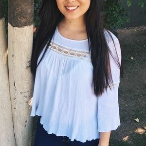 Delicate white long sleeve top