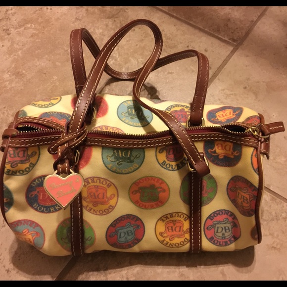 Dooney and Burke small barrel bag with wristlet - Picture 3 of 4