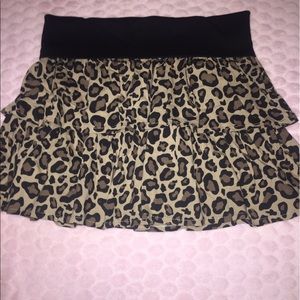 New with tag-Leopard print skirt. Size 10-12.