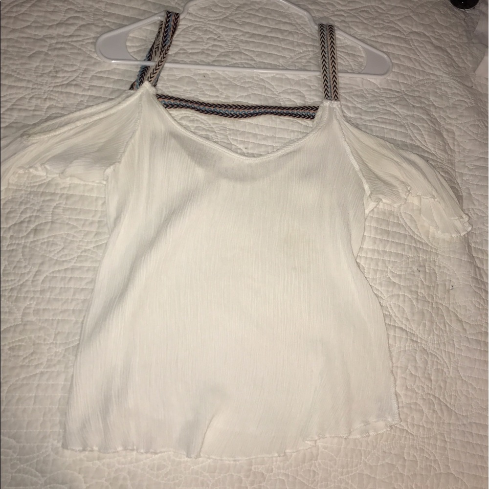 flowy white top with colorful straps