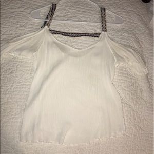 flowy white top with colorful straps