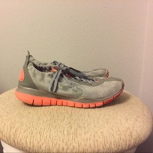Lightly warn grey and pink Nike Free Twist