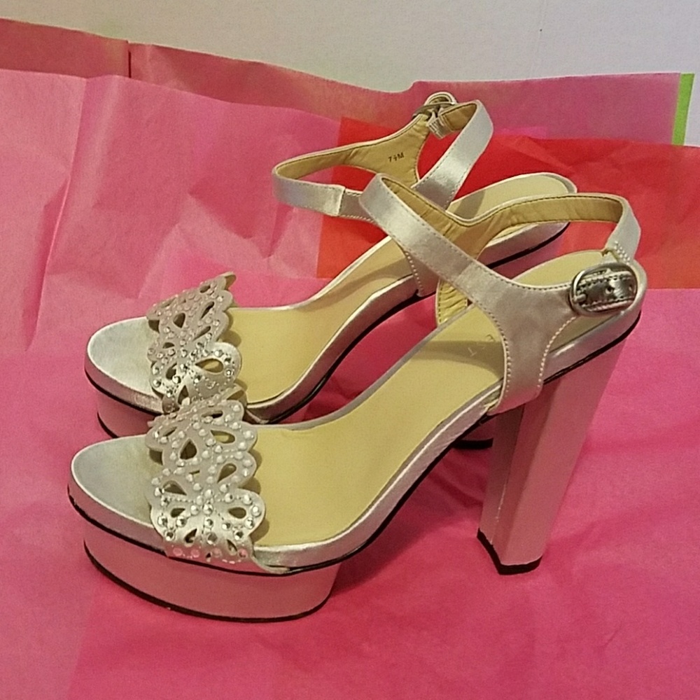 Cute nine west strappy shoes.