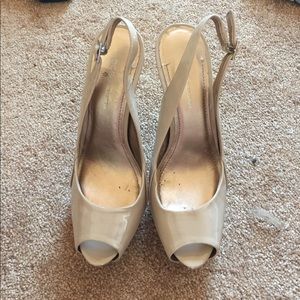 BCBGeneration nude peep toe pumps