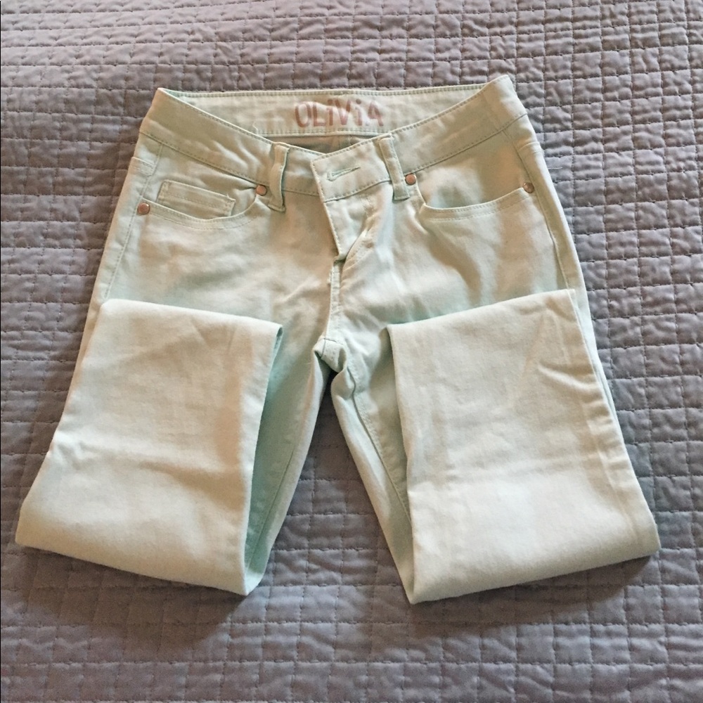 Delia's mint green skinny jeans in Junior size.