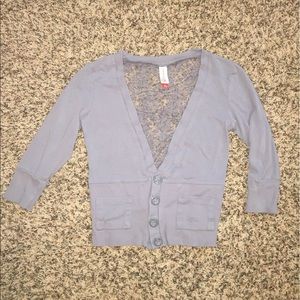 Super cute grey top with lace back.