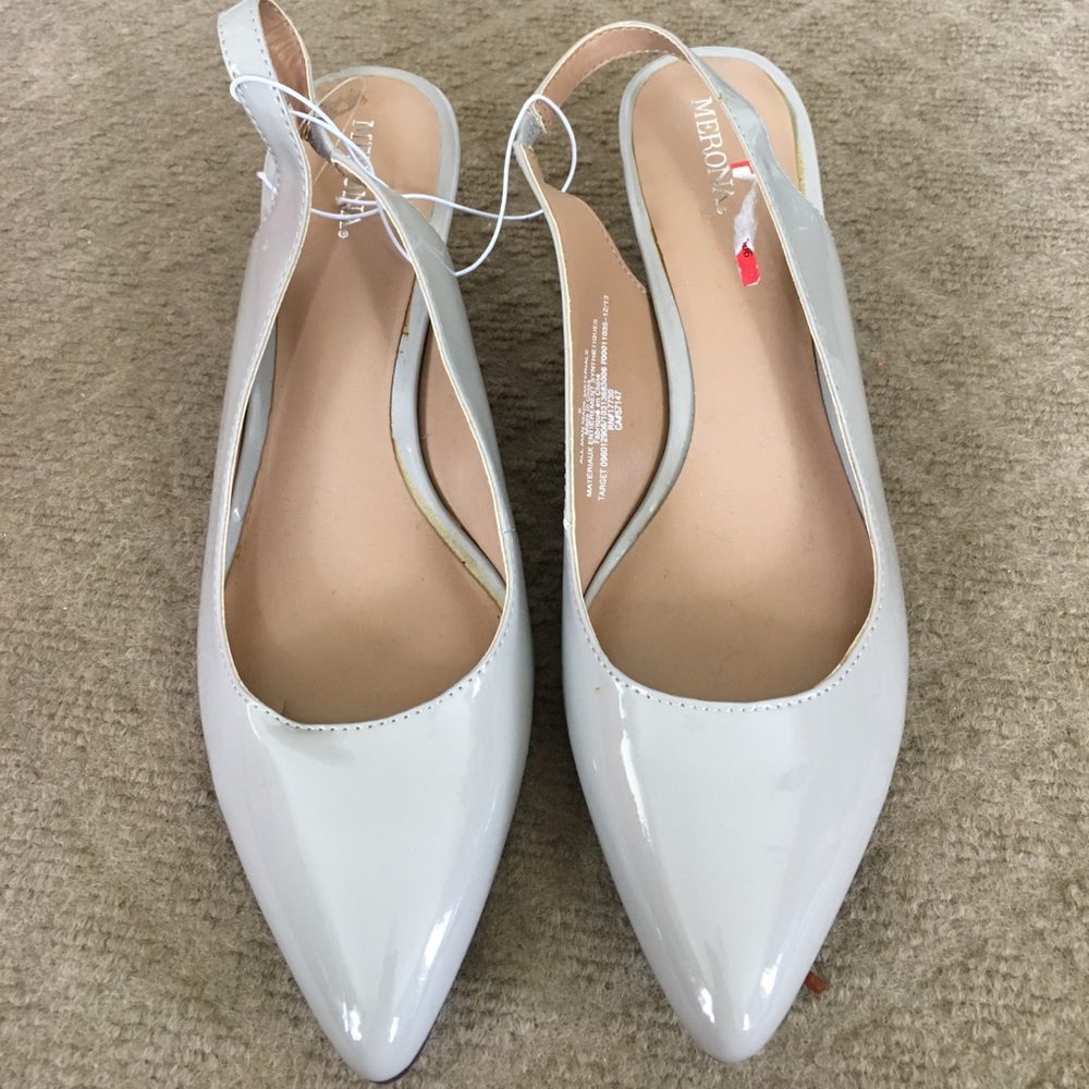 Tan patent leather shoes.
