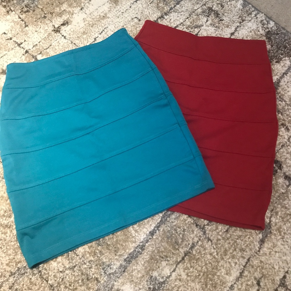 Two mid thigh length pencil skirts