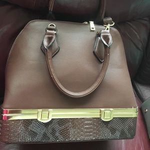 Brown bottom compartment handbag