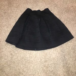 Beautiful pleaded black Devlin skirt