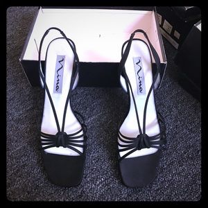 Nina black satin open toe sandal with heel.