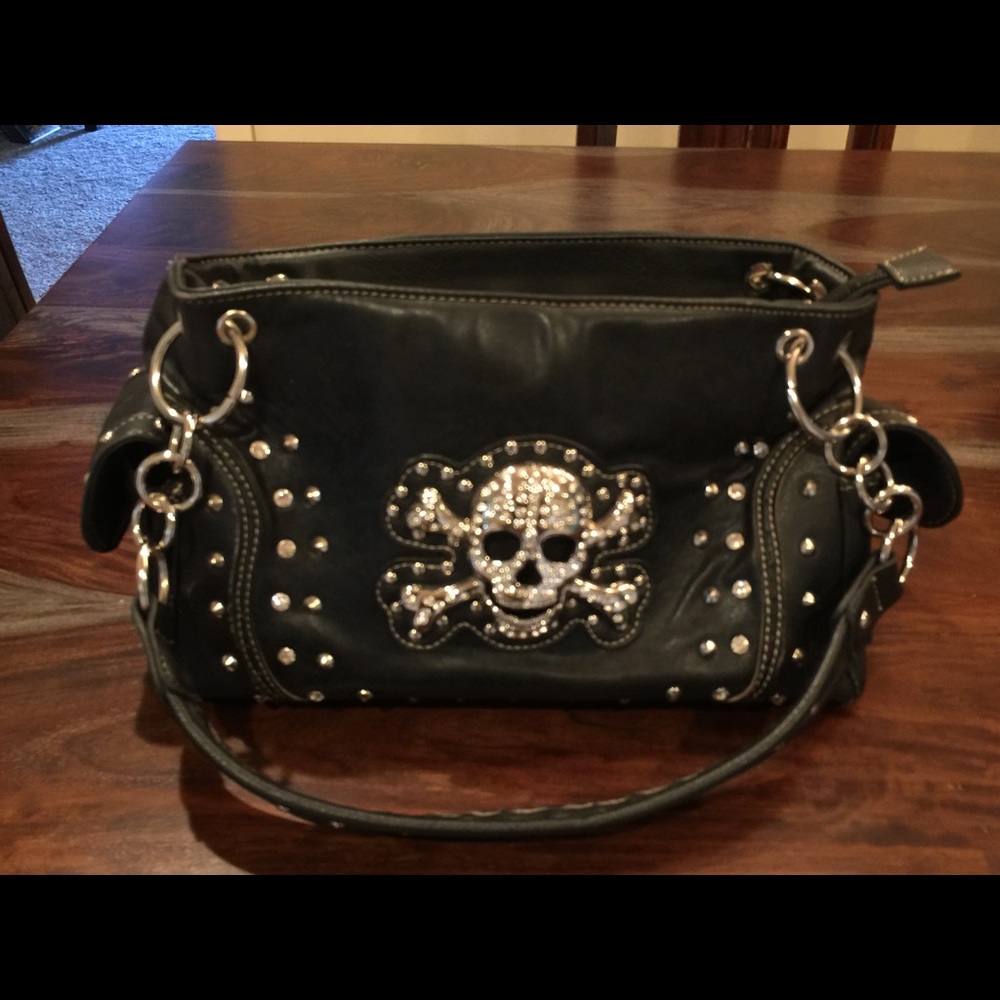 Diamond studded skull leather purse