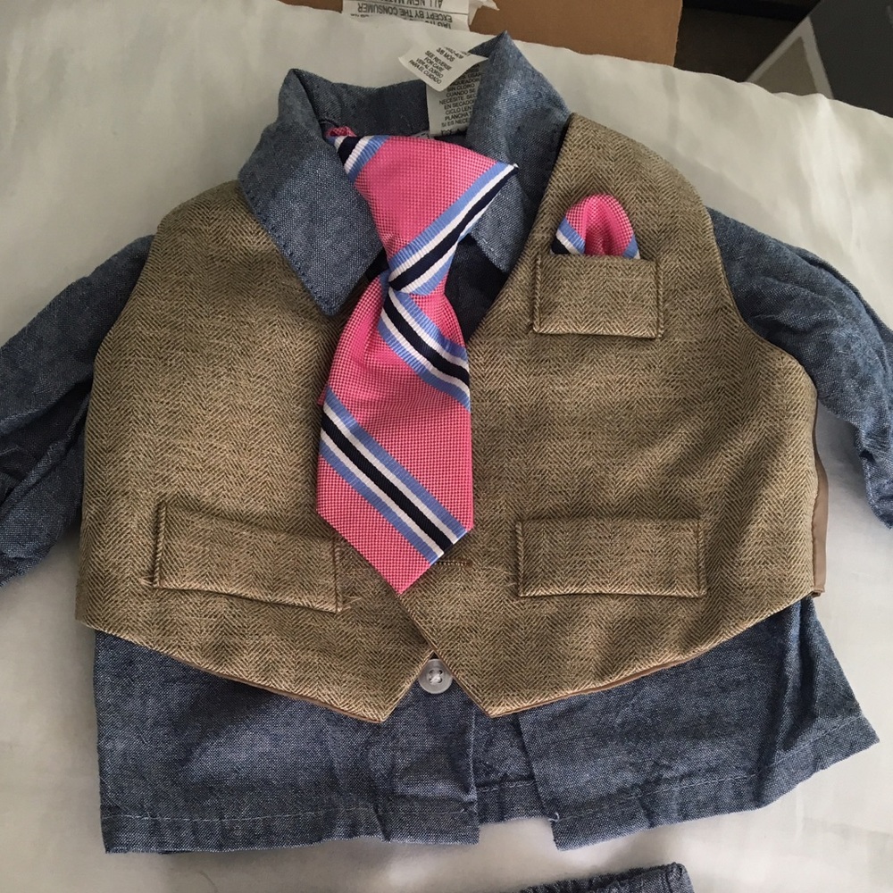 👔