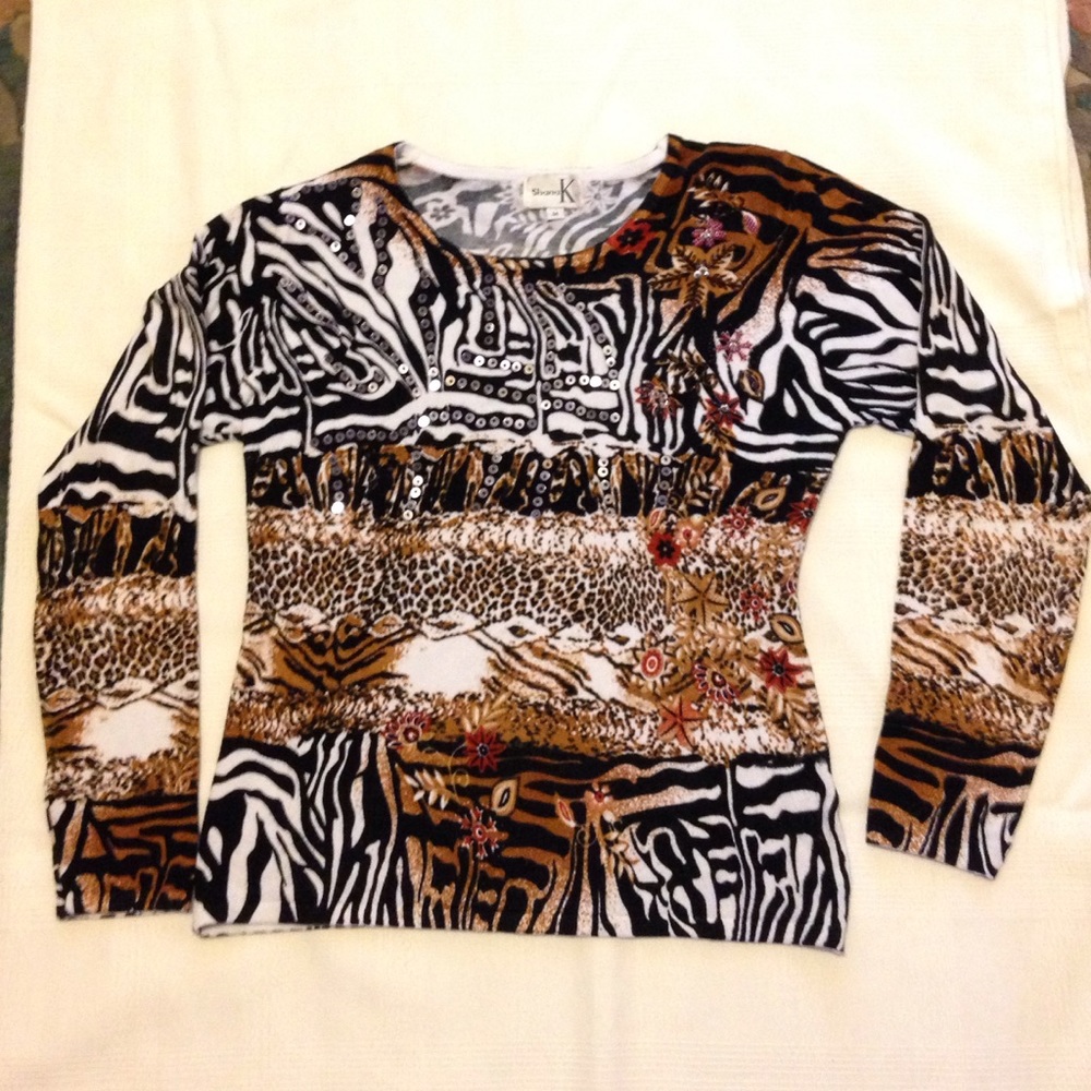 Animal print sweater with emblishments
