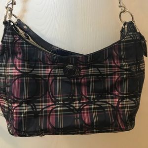 Purple and blue coach purse