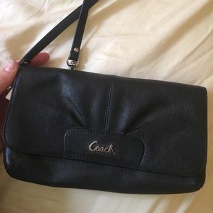 Brand new Coach wallet/clutch comes with strap!