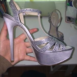 8.5 silver heels by Aldo