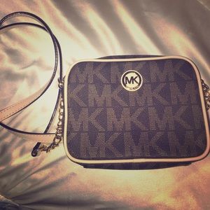 Michael Kors cross body purse.