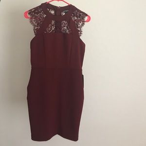 Crimson form fitting dress with lace detail