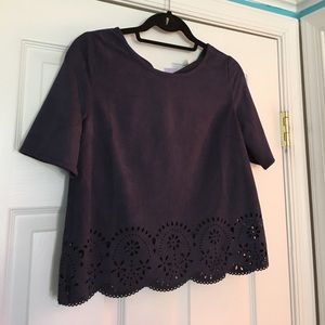 Suede top with a perforated scalloped detail