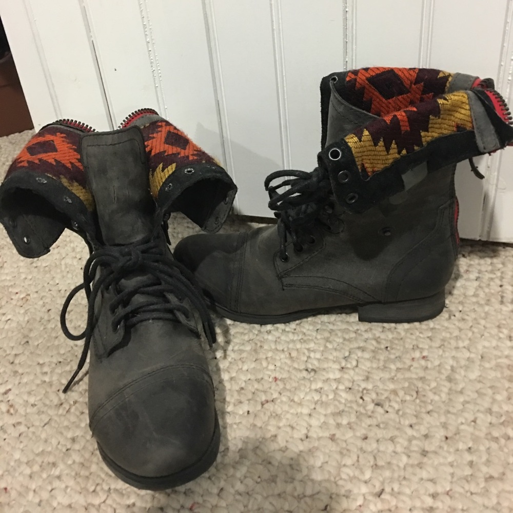 Black Steve Madden adjustable combat boots