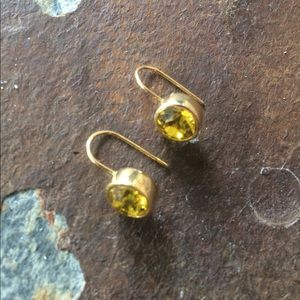 Beautiful gold tone earrings with Green stone