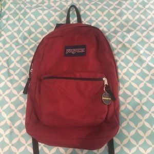 Burgundy Jansport book bag