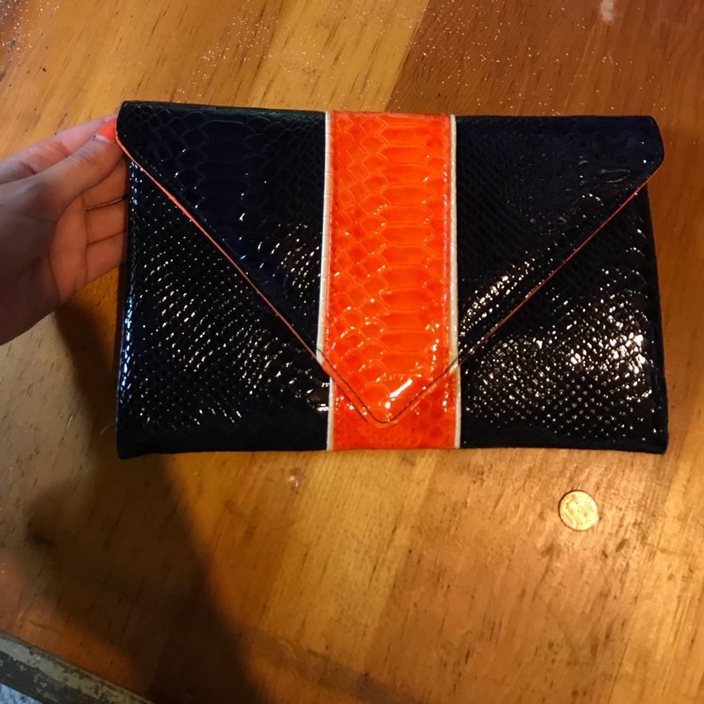 Navy and orange clutch