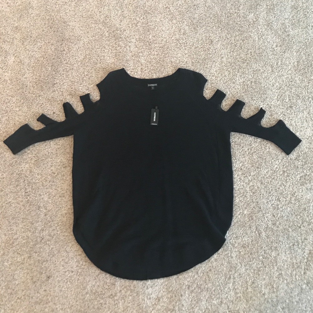 Over sized light sweater with arm cut outs