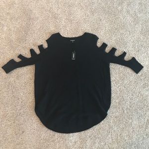 Over sized light sweater with arm cut outs