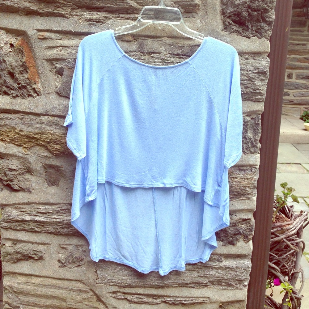 Flowy light blue slightly cropped blouse