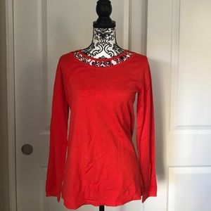 Cute orange summer sweater with cut out detailing