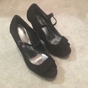 Lauren Conrad black wedges. Size 8
