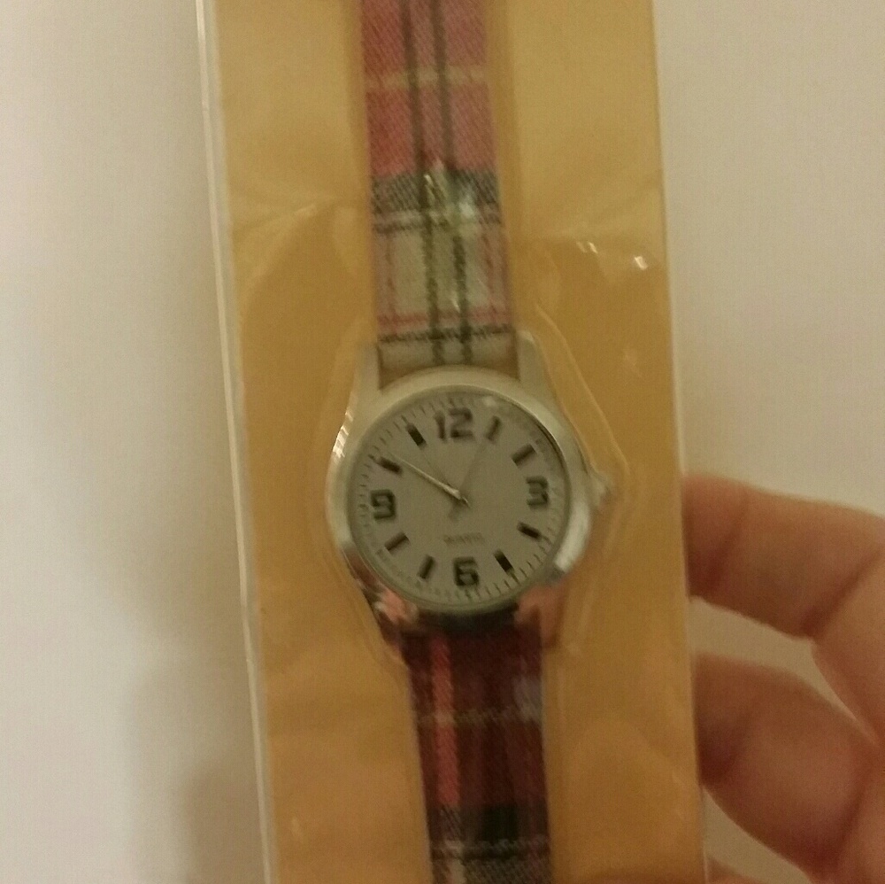 Brand new watch. Very cute. Blue white red.