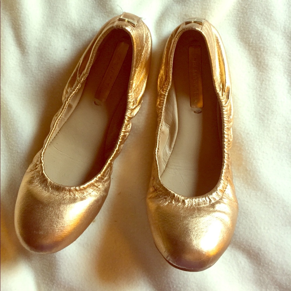 BCBG Maxazaria gold flats