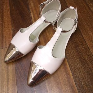 Soft pink dress shoes.