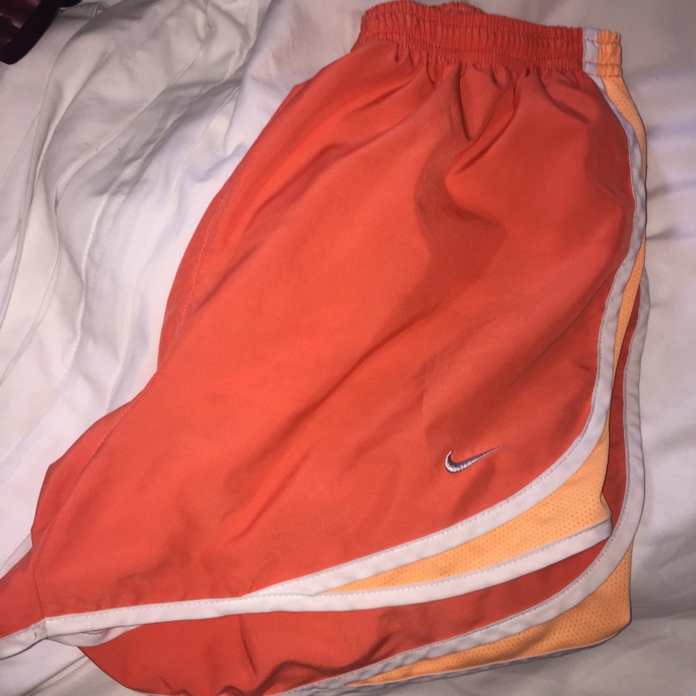 Orange Nike dri-fit tempo shorts