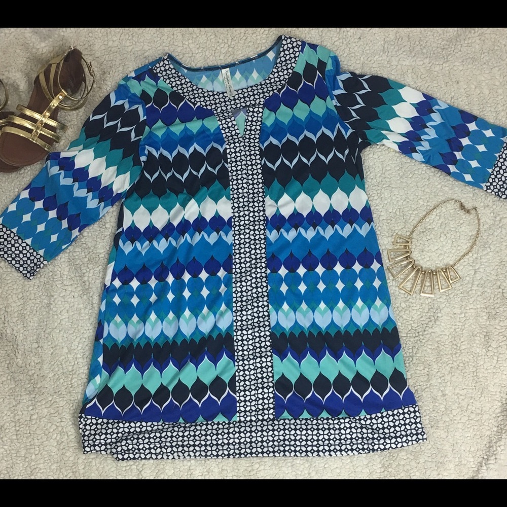 Never worn Shift Dress with Geometric Print.