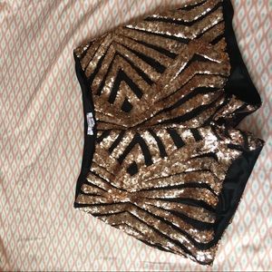 Rose gold and black shorts